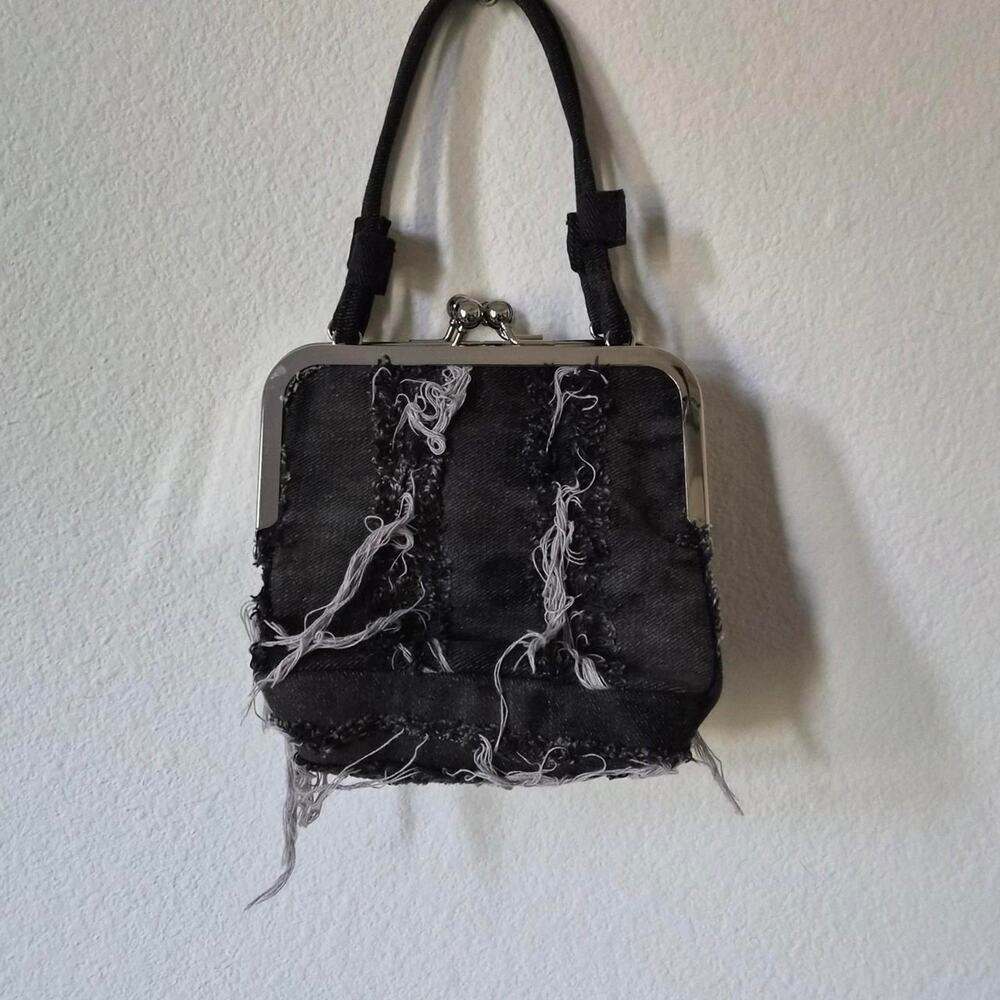 Lowsh distressed jean kisslock purse